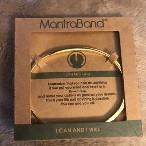 Mantra band. Gold w/black inscription